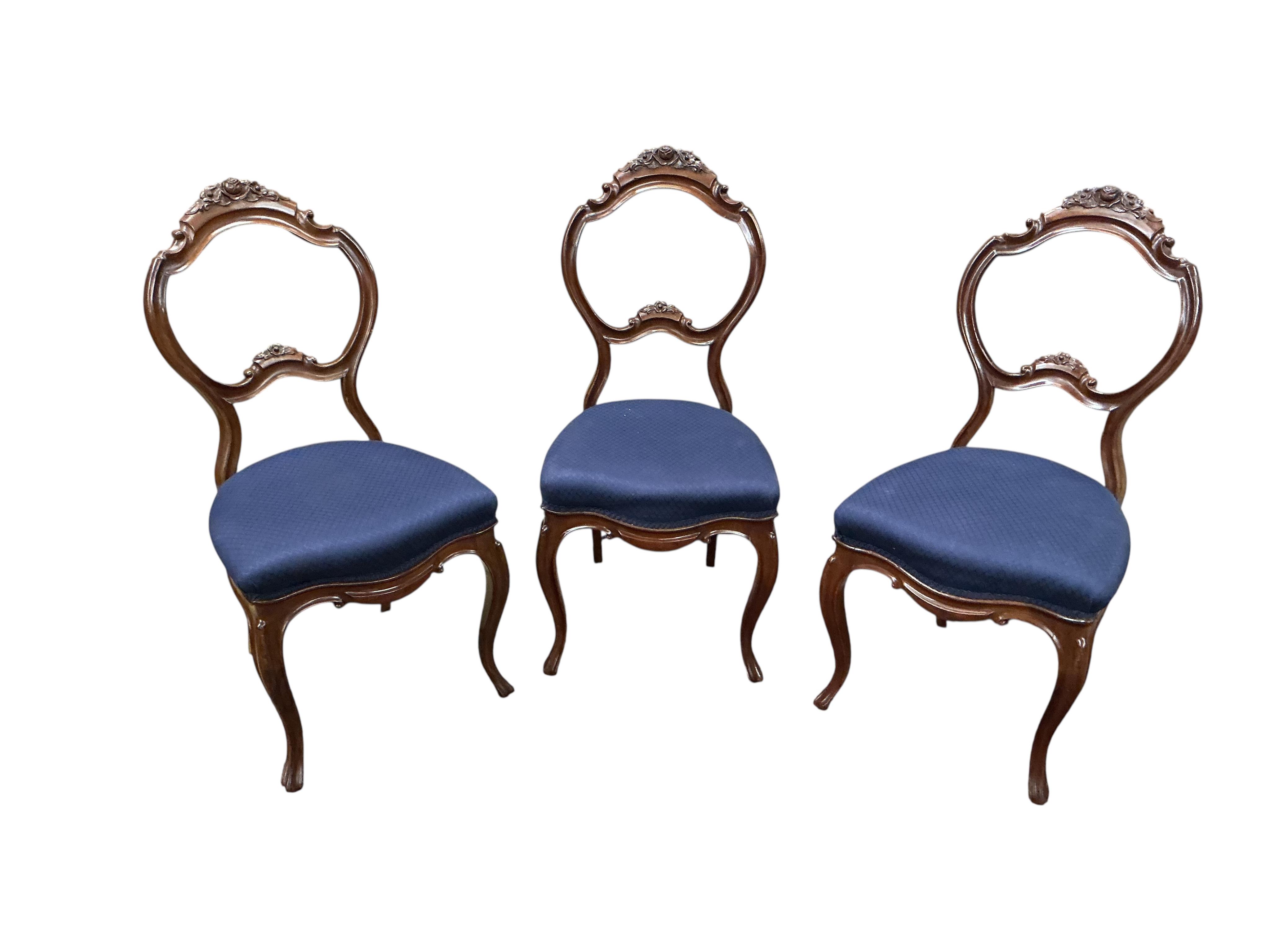 A set of six 19th century French carved mahogany balloon back dining chairs, width 46cm, height 96cm